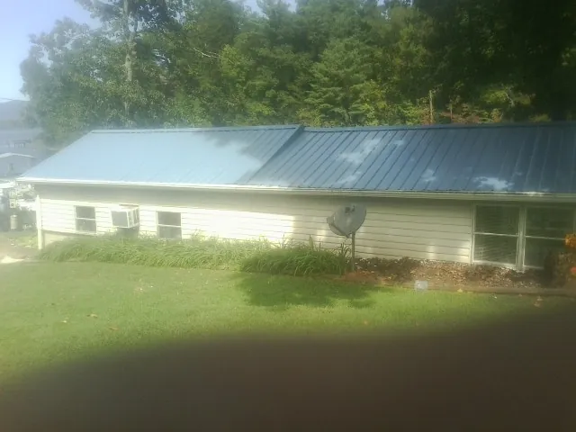 Blue metal roof running the length of a single story home in Indian Rocks Beach